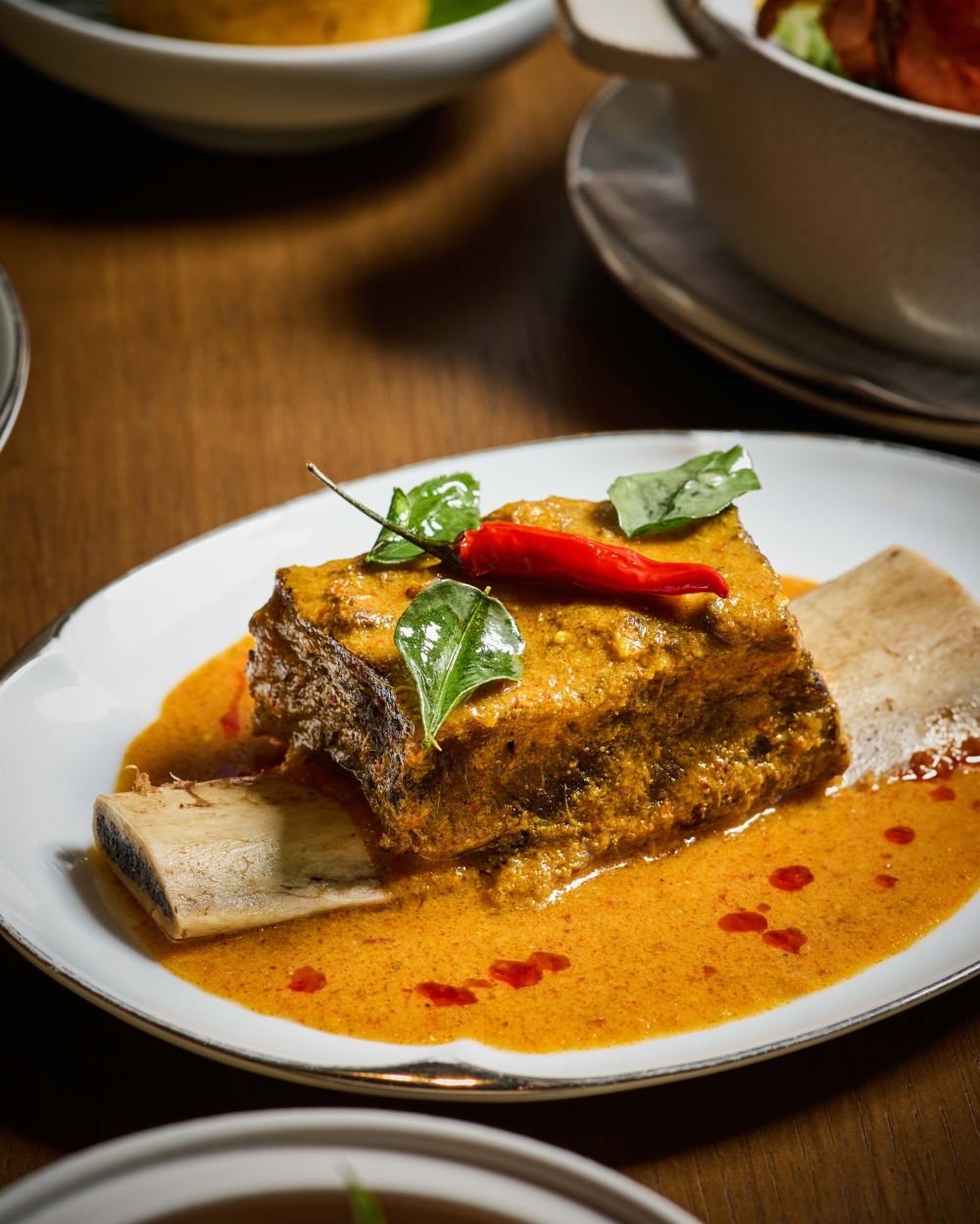 Daging Tulang Rusuk Kapitan, featuring slow-braised beef short rib cooked with ground spices, coconut cream and lime. — Picture courtesy of Park Hyatt Kuala Lumpur