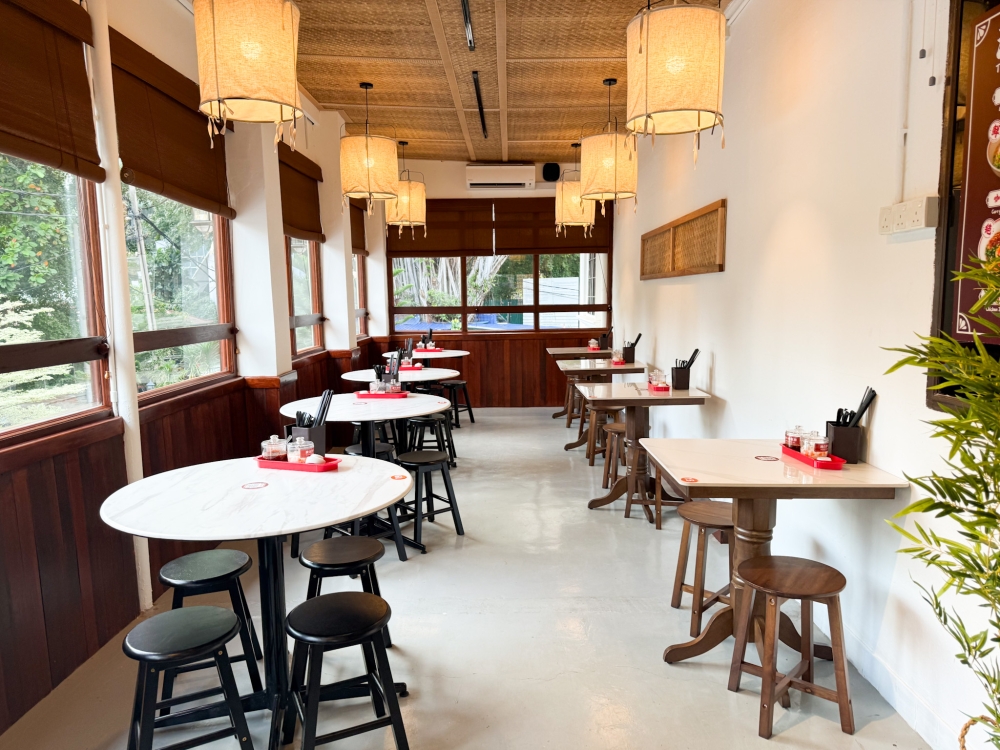Dine in comfort in this modern coffee shop setting. — Picture by Lee Khang Yi