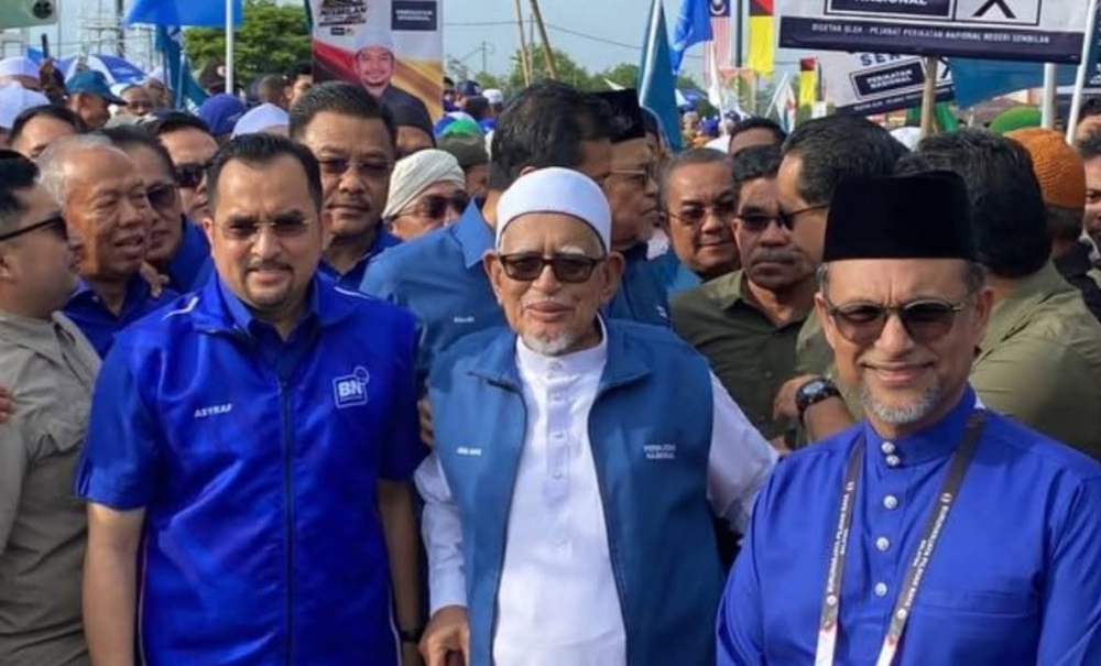 PAS president Tan Sri Abdul Hadi Awang attends nomination day for the Serting state seat in Jempol, where he said Perikatan Nasional and Barisan Nasional would campaign for each other’s candidates. — Social media pic