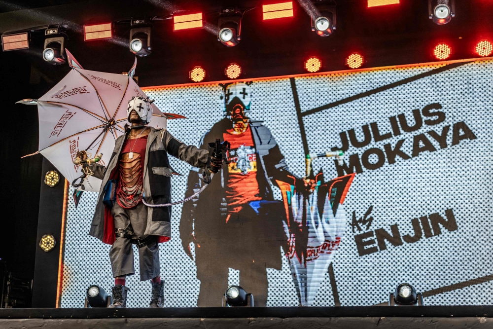 Cosplayer Julius Mokaya, 34, takes the stage while cosplaying as Enjin, a character from the popular manga series Gachiakuta during the Otamatsuri convention in Nairobi on August 22, 2026. — AFP pic