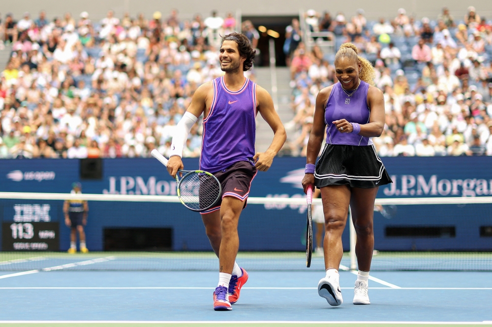 Serena Williams and Carlos Alcaraz shared plenty of smiles during their US Open mixed doubles run before bowing out in the quarter-finals. — AFP pic
