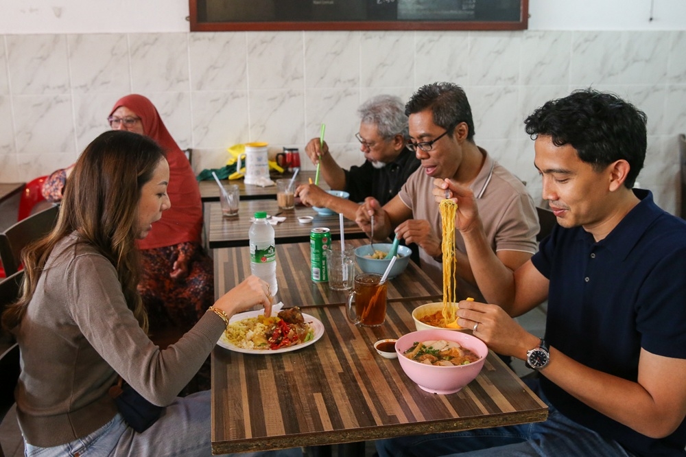 The restaurant is packed with diners, mostly locals and even a few Japanese, who are here to enjoy their regular orders. — Picture by Choo Choy May