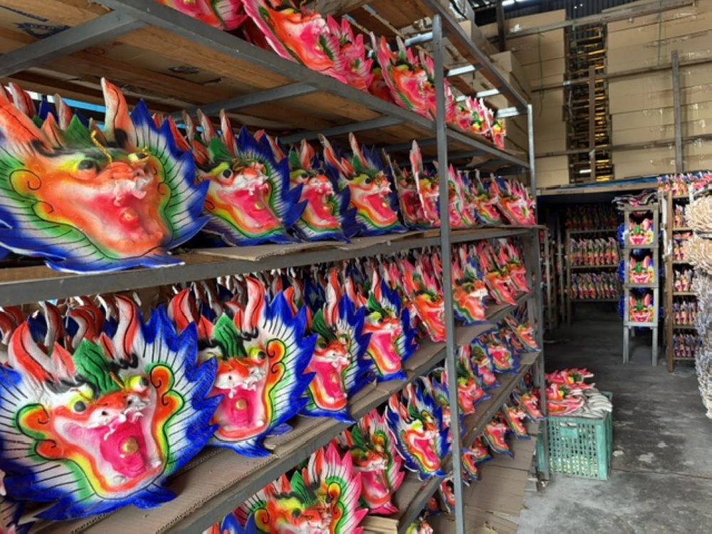 The painted dragon heads ready to be attached to the joss sticks. — Picture by Opalyn Mok
