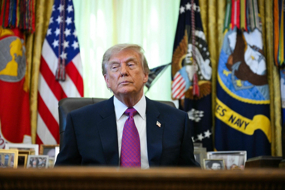 US President Donald Trump speaks in the Oval Office of the White House in Washington, DC, on August 27, 2026. — AFP pic
