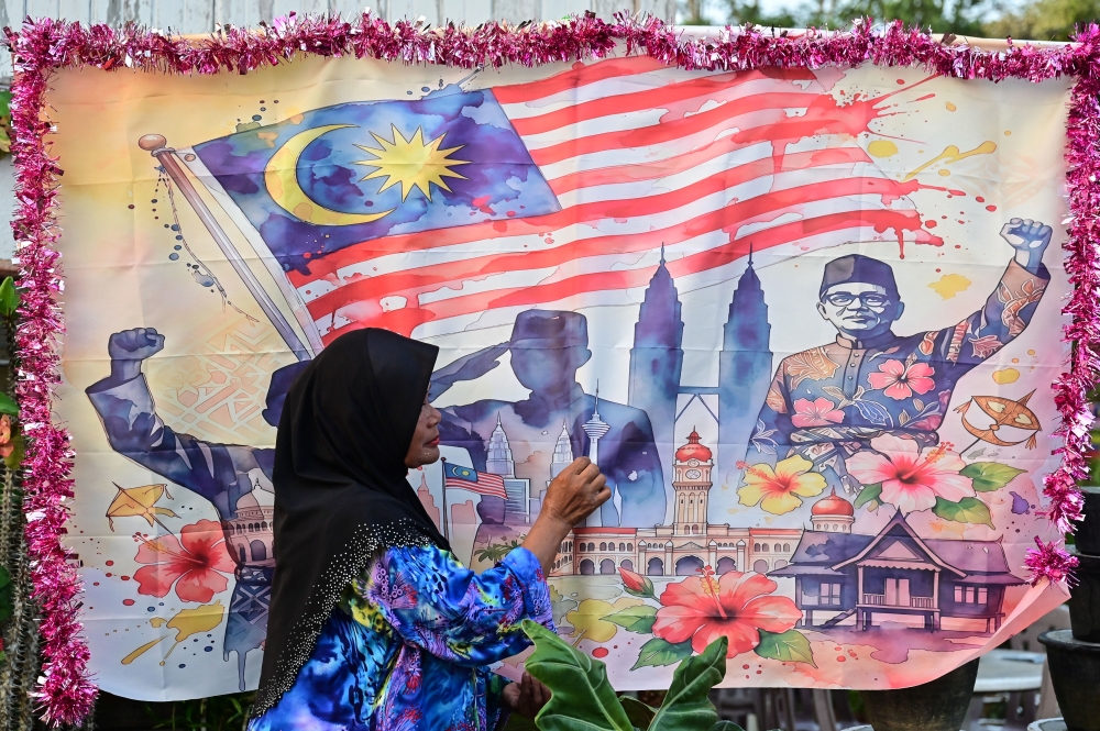 Kitam Mat Deris said the decorations are a simple way of expressing her love for the country and sharing the Merdeka spirit with younger generations. — Bernama pic