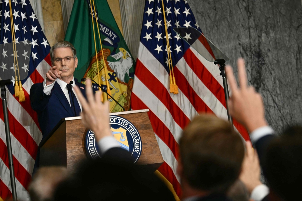 US Secretary of the Treasury Scott Bessent takes questions from reporters as he speaks during a press conference in Washington, DC August 24, 2026. — AFP pic