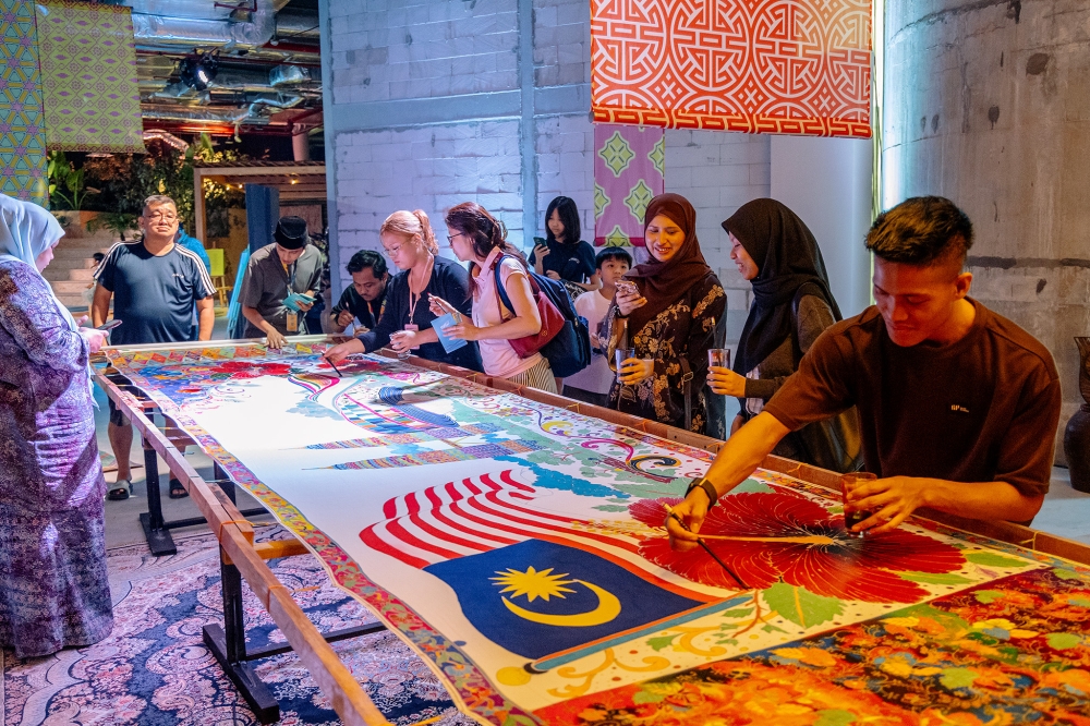 A large communal artwork featuring Malaysian cultural motifs is seen at Ombak KLCC in Kuala Lumpur, Aug 28, 2026. — Picture by Firdaus Latif.