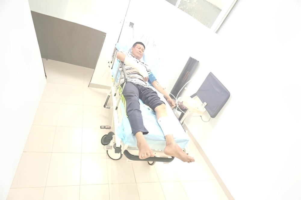 Sabah clam hunter survives crocodile attack after friend beats nine-foot reptile on the head
