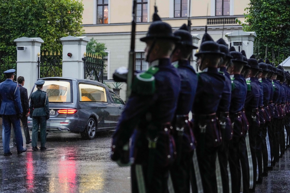 Honour guards line up as the hearse carrying late King Harald V of Norway arrives at Queen’s Park in Oslo on August 28, 2026, following the monarch’s death at the age of 89 after a 35-year reign. — AFP pic