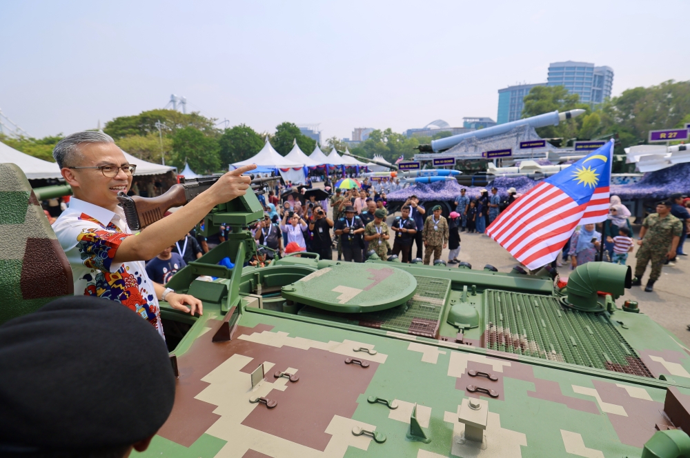 Communications Minister Datuk Seri Fahmi Fadzil inspects machinery showcased to the public as part of the Malaysian Armed Forces’ (MAF) asset participation in the 2026 National Day parade at Dataran Putrajaya August 29, 2026. — Bernama pic