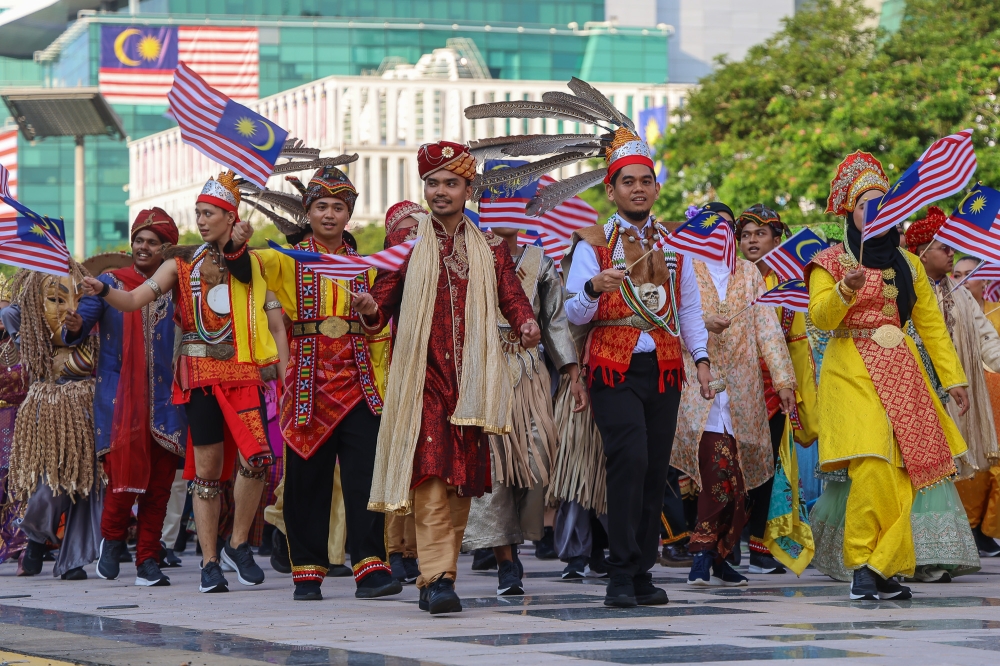 Participants wear traditional attire during the National Day 2026 parade at Dataran Putrajaya in Putrajaya on August 31, 2026. — Picture by Yusof Isa