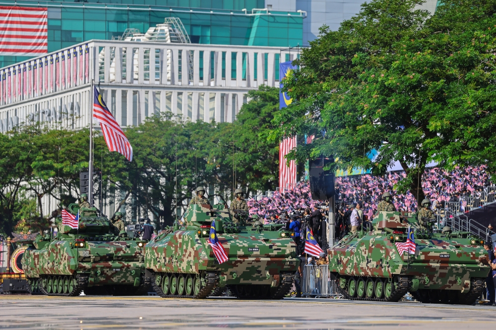 A convoy of tanks is seen during the 69th National Day parade at Dataran Putrajaya in Putrajaya on August 31, 2026. — Picture by Yusof Isa