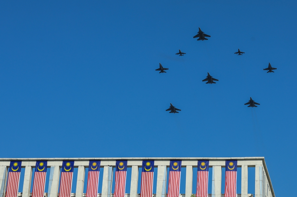 Malaysian Royal Air Force fighter jets fly above the crowd during the National Day Parade at Dataran Putrajaya in Putrajaya on August 31, 2026. — Picture by Yusof Isa