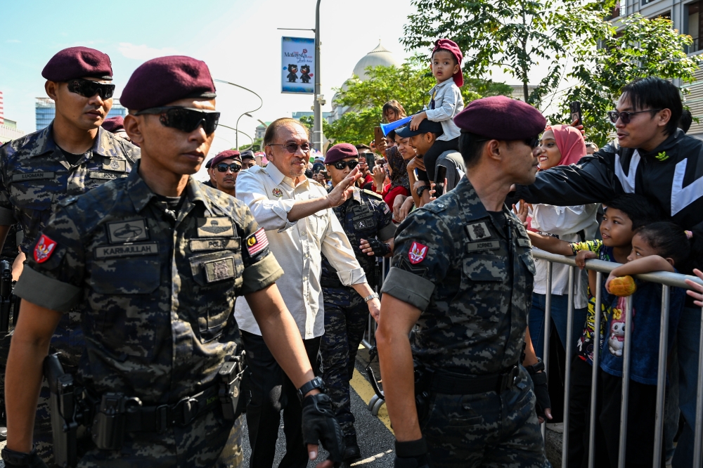 ‘Great show!’ Anwar thanks Malaysians, mingles with crowds at National Day parade