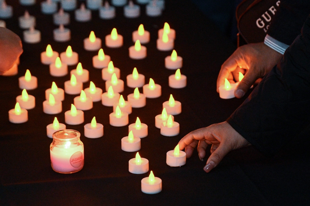 Members of the Nepalese community gather to pay their respects to victims of the flash floods in Nepal, in Sydney on September 2, 2026. — AFP pic