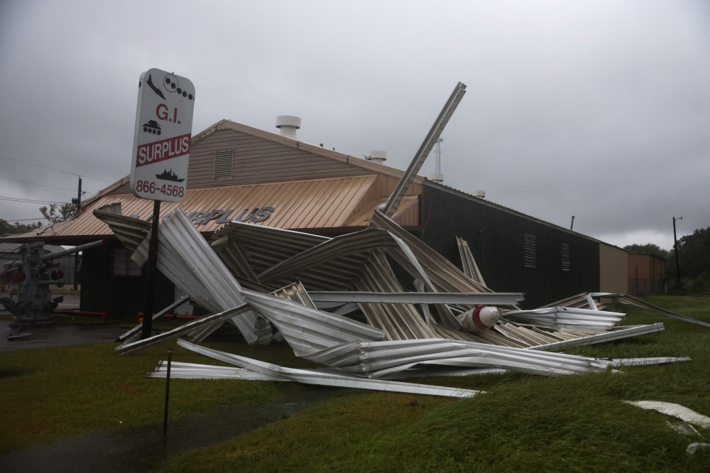 A damaged G.I. Surplus store is seen during Tropical Storm Edouard in Beaumont, Texas, on September 1, 2026. — Getty Images pic via AFP