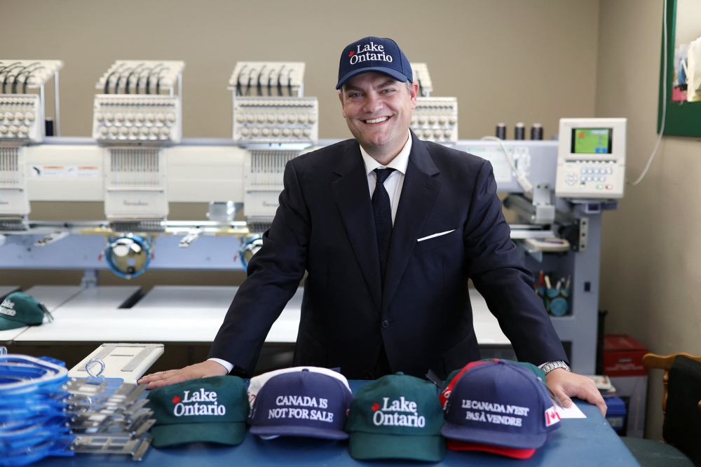 Liam Mooney, CEO and strategic leader of Jackpine Dynamic Branding and creator of the ‘Lake Ontario’ cap, poses for a portrait in Ottawa, Ontario, on September 1, 2026. — AFP pic