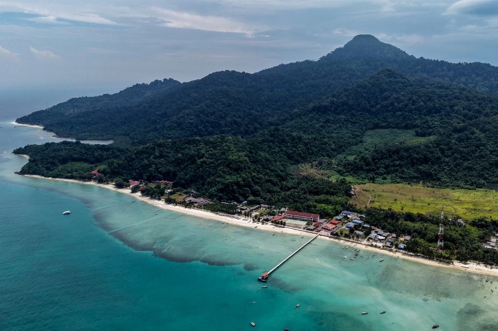 The beauty of Pulau Tinggi, surrounded by crystal-clear waters, is among the attractions drawing tourists to Mersing and supporting the island community’s economy through tourism. — Bernama pic