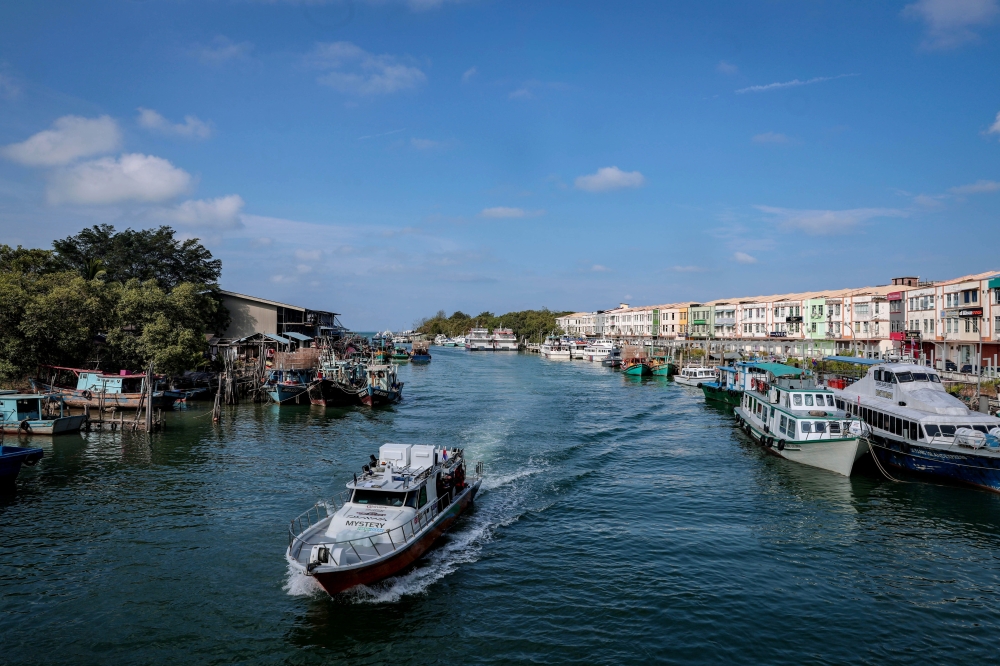 A boat carries tourists to islands off Mersing, helping to support the local economy. — Bernama pic