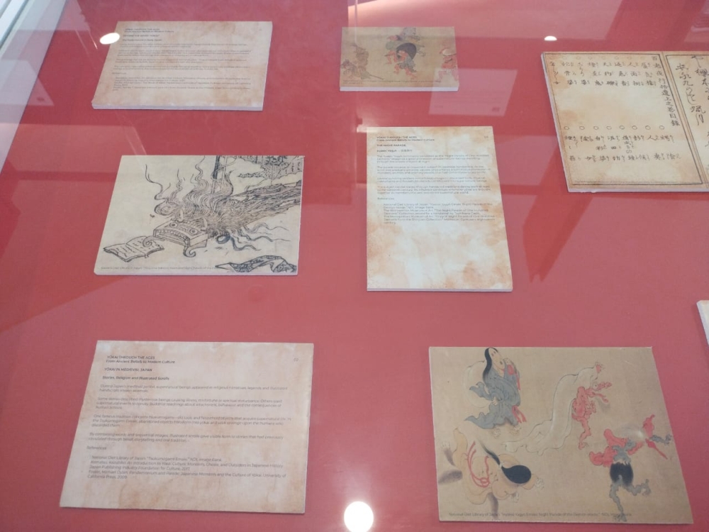 Scroll artworks on display featuring Japanese folklore related to yōkai. — Picture by Ian Jeremiah