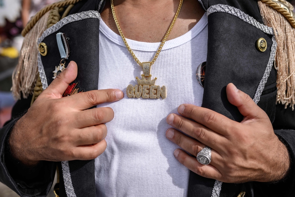 A fan poses during Montreux Freddie Day, marking the 80th anniversary of the birth of Freddie Mercury, the Queen frontman, in Montreux, Switzerland, on September 5, 2026. — AFP pic