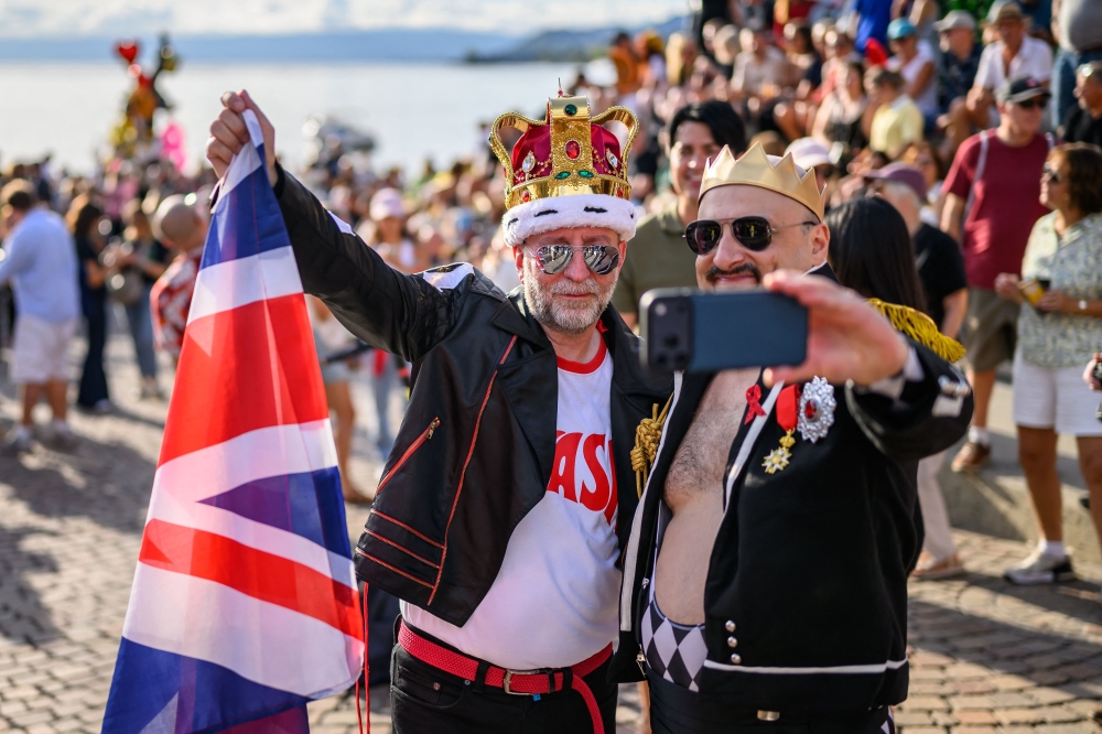 Fans take part to Montreux Freddie Day, marking the 80th anniversary of the birth of the Queen frontman Freddie Mercury, in Montreux, Switzerland, on September 5, 2026. — AFP pic