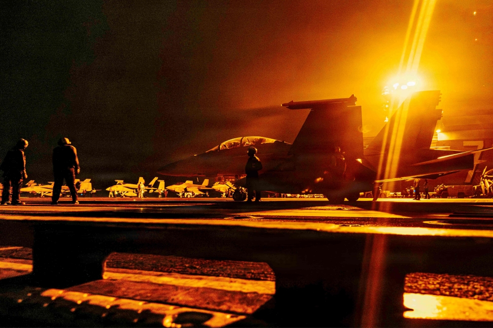In this US Navy handout photo, an F/A-18 Super Hornet assigned to Strike Fighter Squadron (VFA) 195, readies for takeoff on the flight deck of Nimitz-class aircraft carrier USS George Washington (CVN 73) on August 29, 2026. Iran launched a wave of attacks on US sites across the Middle East on September 2 as violence surged after an extensive American bombardment and the deaths of four people at an Iranian wedding party. — US Navy pic via AFP