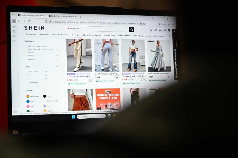 An internet user checks the Asian e-commerce giant Shein website page on a laptop in Paris on November 5, 2025. — AFP pic