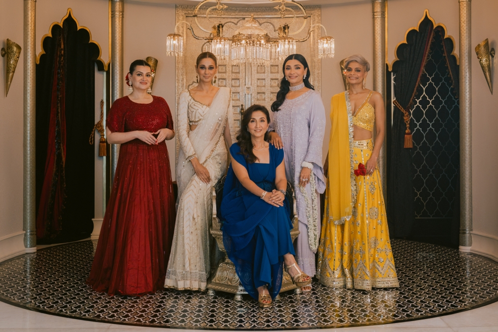 LuxuriAsia founder Sherina Binwani (centre, in blue) with the campaign faces for LuxuriAsia Diwali Edit 2026, which brings together a curated mix of fashion, jewellery and accessories ahead of the Deepavali and year-end wedding season.(From left: Zena Khan, Kavita Sidhu, Sarah Ilyas and Jaclyn Victor) — Picture by Raion Ridge 