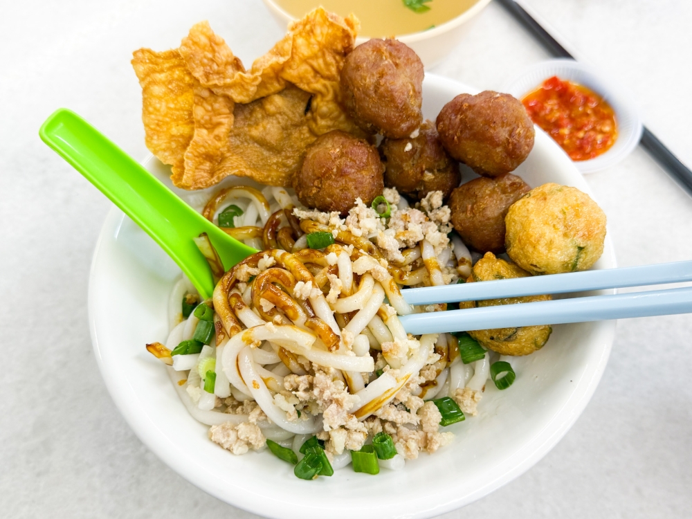 It’s not your usual short, tapered noodles but longer, slightly bouncy noodles that are uniquely a Seremban-style. — Picture by Lee Khang Yi 