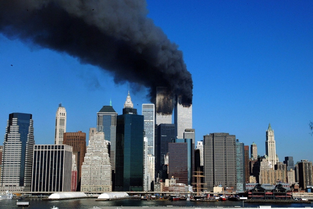 The twin towers of the World Trade Center billow smoke after hijacked airliners crashed into them early on September 11, 2001. September 11, 2026, will mark the 25th anniversary of the September 11, 2001, attacks that killed nearly 3,000 people in New York, Washington and Pennsylvania. — AFP pic 