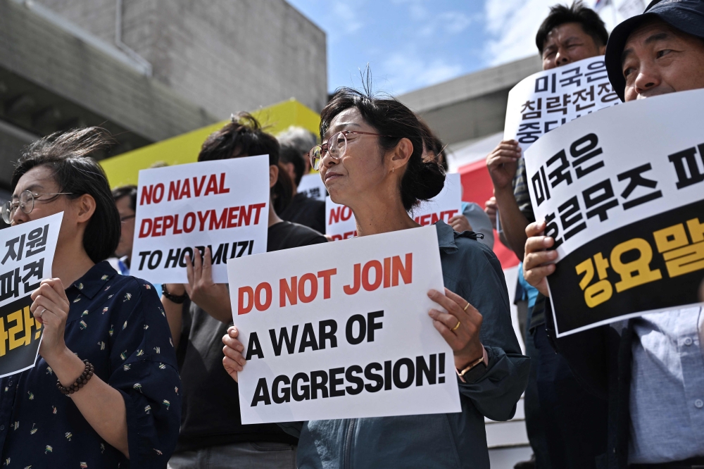 People protest against South Korea’s potential military involvement in the US operations in the Strait of Hormuz, in Seoul September 9, 2026. — AFP pic