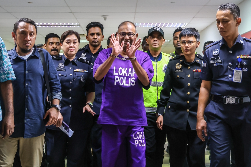 MACC: Abdul Azeez chose to remain in purple lock-up attire, handcuffs for court appearance