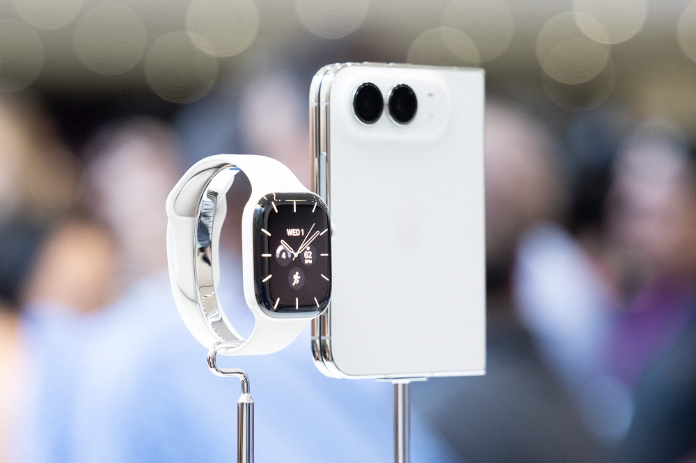 An Apple Watch series 12 and iPhone Duo are displayed at Apple’s ‘Surprise and Shine’ event at the company’s corporate headquarters, Apple Park in Cupertino, California September 9, 2026. — Benjamin Fanjoy/Getty Images North America/Getty Images pic via AFP