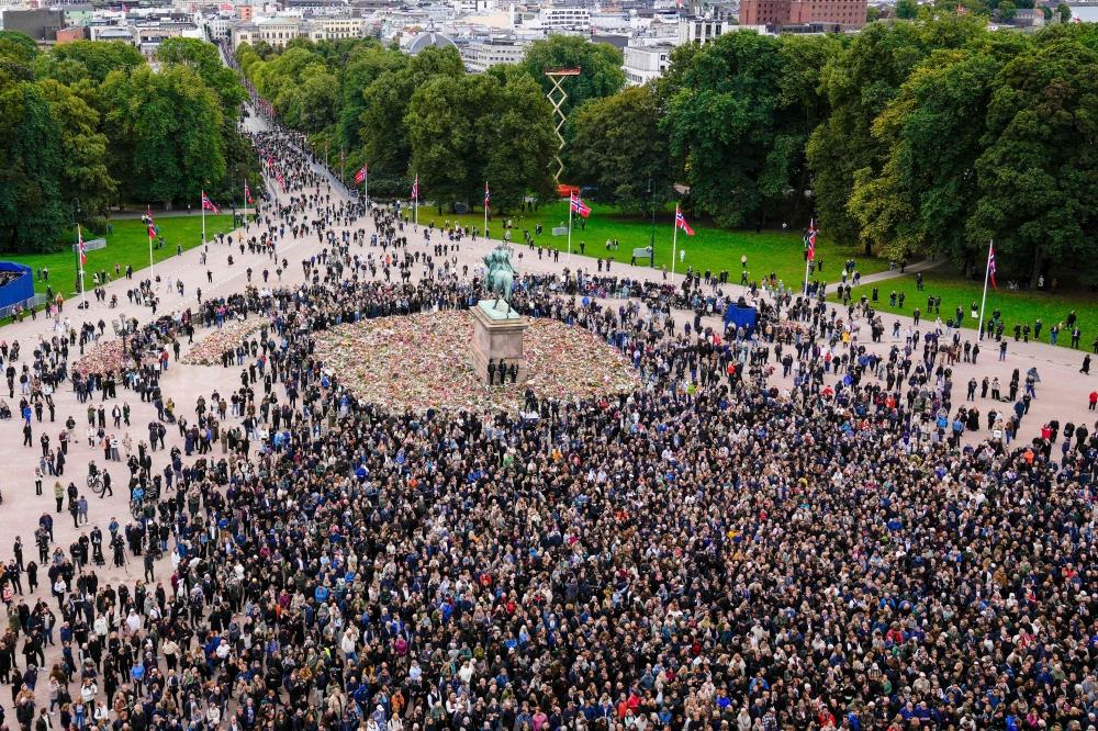 Spectators flock towards the Royal Palace to greet members of the royal family in Oslo, Norway, on September 9, 2026 after Norway’s late King Harald V was laid to rest at Akershus Castle. — Haakon Mosvold Larsen/NTB/AFP pic 