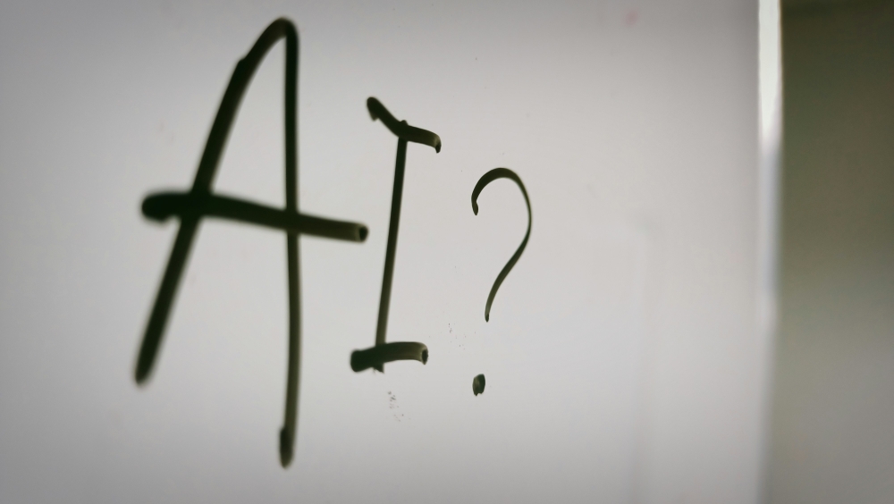 The author argues that universities should redesign assessments to evaluate students’ critical thinking and intellectual contribution when using AI, rather than focusing mainly on detecting or restricting its use. — Unsplash pic