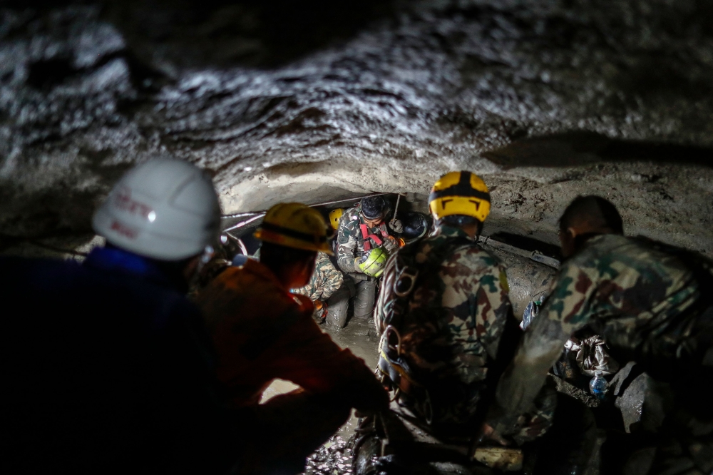 Nepali soldiers spend days of digging inside the Chilime Hydropower Station days for survivors after deadly flash floods and mudslides in Nepal's Rasuwa district on September 10, 2026. — AFP pic