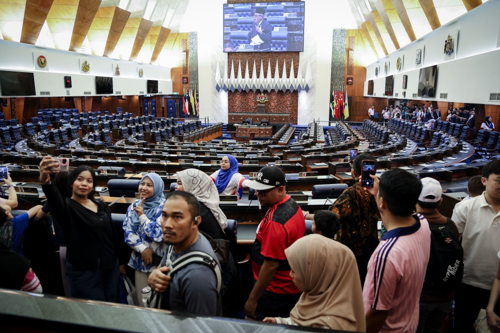 Parliament staff brief visitors inside the Dewan Rakyat and Dewan Negara on the final day of the Malaysia Parliament Open Day 2026 in Kuala Lumpur on September 13, 2026. — Bernama pic