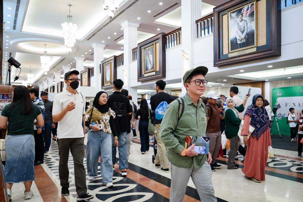 Visitors take a closer look at the Parliament lobby during the Malaysia Parliament Open Day 2026 in Kuala Lumpur on September 13, 2026. — Bernama pic