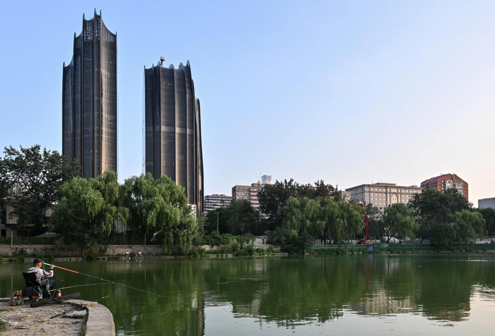 A view of Chaoyang Park Plaza, designed by MAD Architects and inspired by traditional ‘shanshui’ Chinese landscape paintings. — AFP pic