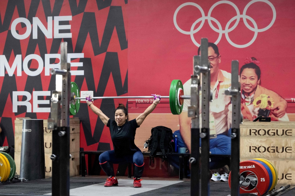 This photograph taken on September 7, 2026 shows Indian weightlifter Mirabai Chanu participating in a training session at a gym on the outskirts of New Delhi, ahead of the upcoming Aichi-Nagoya 2026 Asian Games. — AFP pic