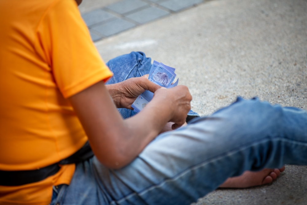 For individuals who are already carrying debt, interest rates matter because they determine how much it costs to borrow, and in the case of revolving credit card balances, how much interest can accumulate over time. — Picture by Raymond Manuel