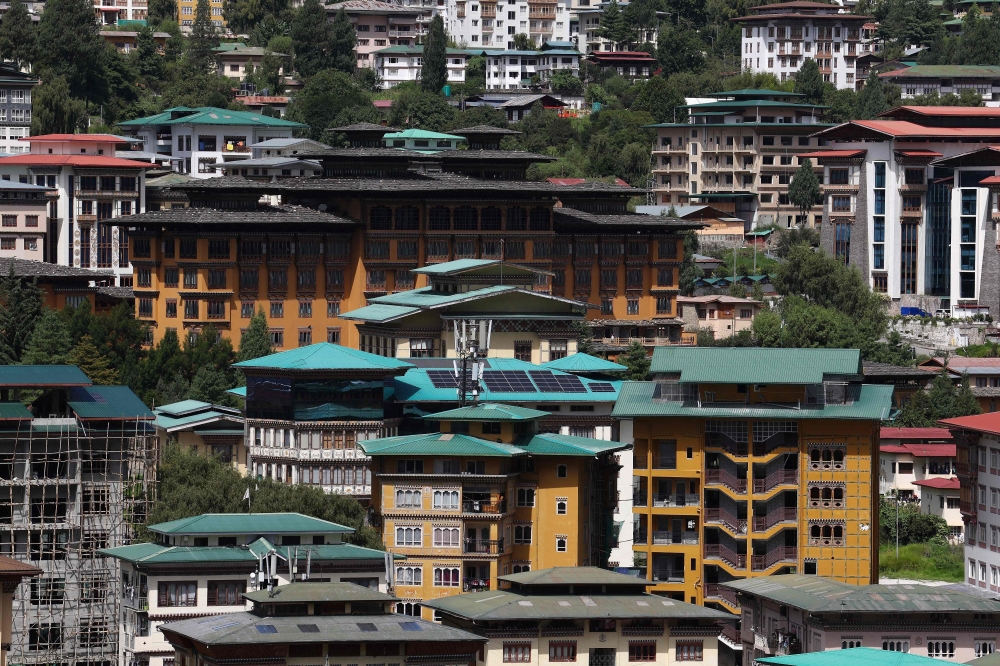 This photograph taken on August 30, 2026 shows solar panels on rooftops of buildings in Bhutan’s capital city of Thimphu. — AFP pic