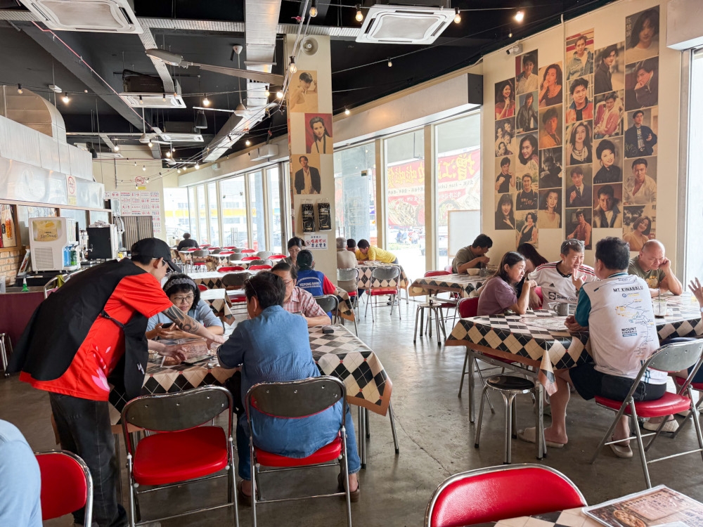 Dine in a retro setting harking back to the 1980s with posters of idols from that era and their famous tunes playing as you tuck into the noodles. — Picture by Lee Khang Yi 