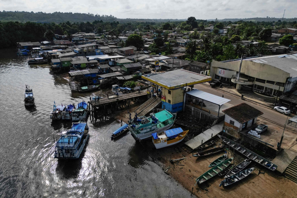 Boats anchored along the banks of the Oiapoque River in Oiapoque, Amapa state, Brazil, on the border with French Guiana, on September 3, 2026 where residents are closely following the oil exploration off the coast of the Amazon, a controversial project promoted by President Luiz Inacio Lula da Silva, who is seeking reelection in October 2026.  — AFP pic