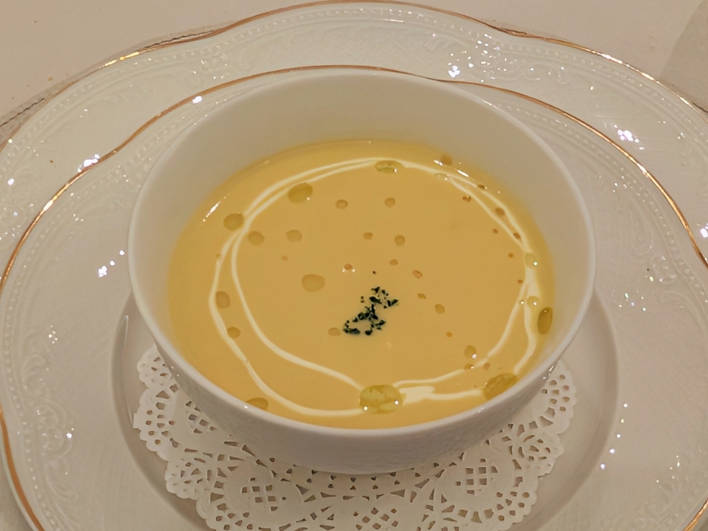 The meal starts with a clean, creamy corn soup. — Picture by Ethan Lau