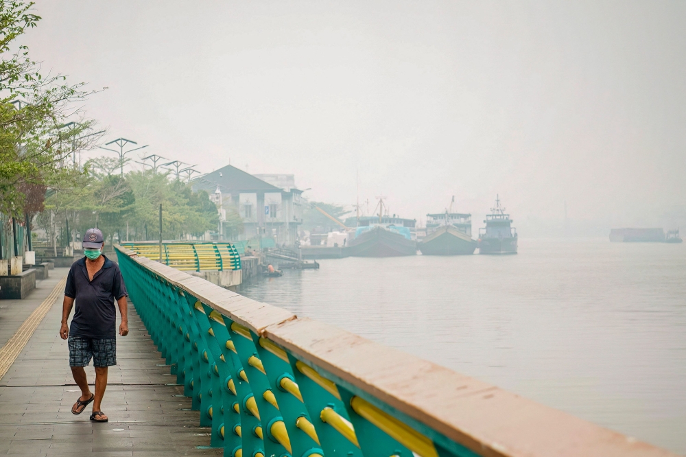 Hotspots, peat fires and palm oil: Why tracing Malaysia’s haze is so complicated