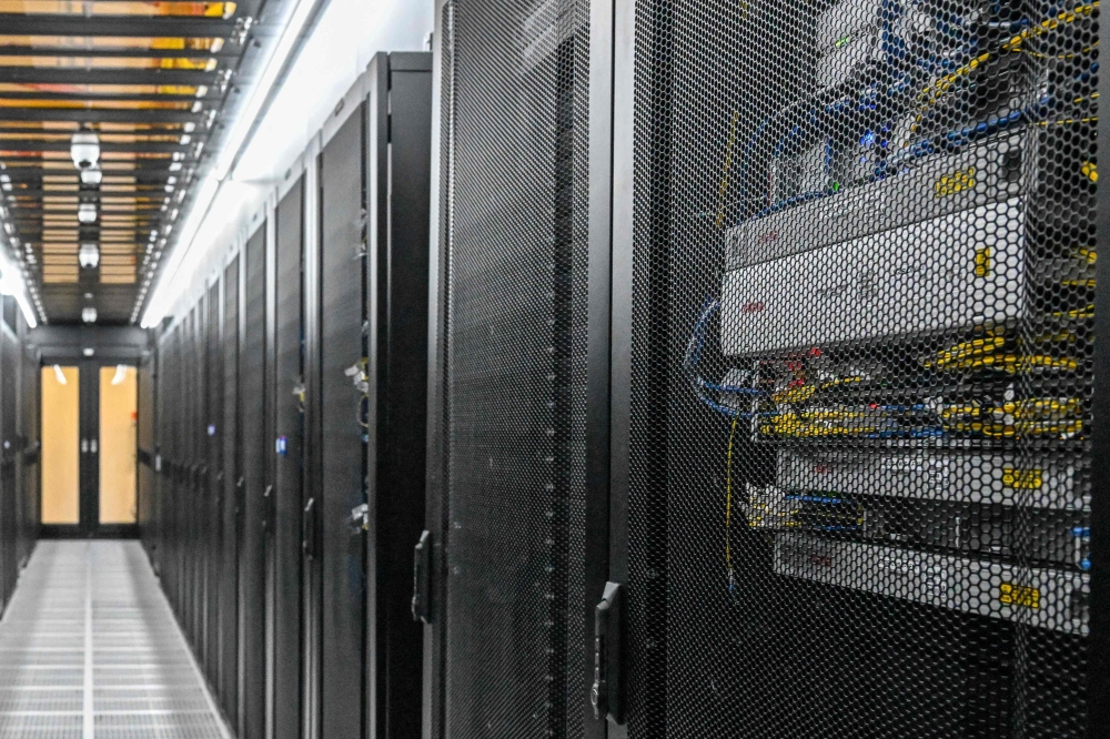 This photo taken on September 2, 2026 shows rows of server rack cabinets at the Digital Realty data centre in Singapore. — AFP pic