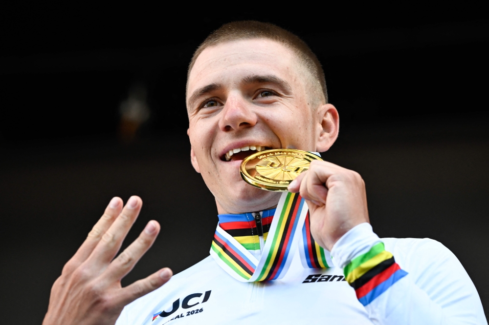 Olympic champion cyclist Evenepoel wins record 4th straight world time-trial title