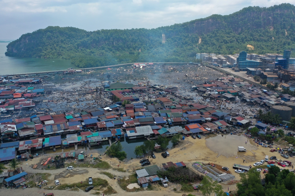 A view of stilt houses destroyed in a fire at Kampung Bahagia in Sandakan April 19, 2026. — Bernama pic